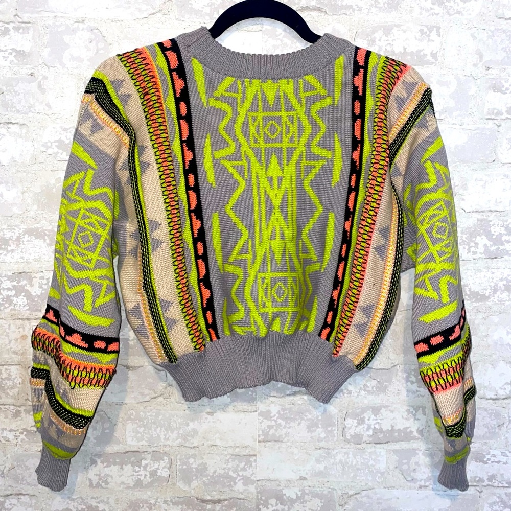 Cropped coogi inspired sweater w/ shoulder slit opening